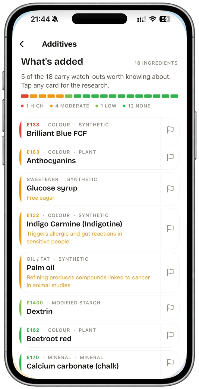 NutraSafe additives screen for a scanned drink: four ingredients, two carrying watch-outs, E150 caramel colour flagged as a possible carcinogen and E338 phosphoric acid flagged, each with its category and source.